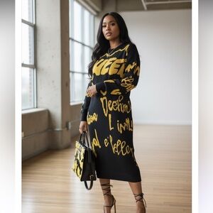 SWEATER DRESS BLACK AND GOLD GRAFFITI QUEEN PLUS SZ 2X UNBD 25 PTP LGTH 42 NWT